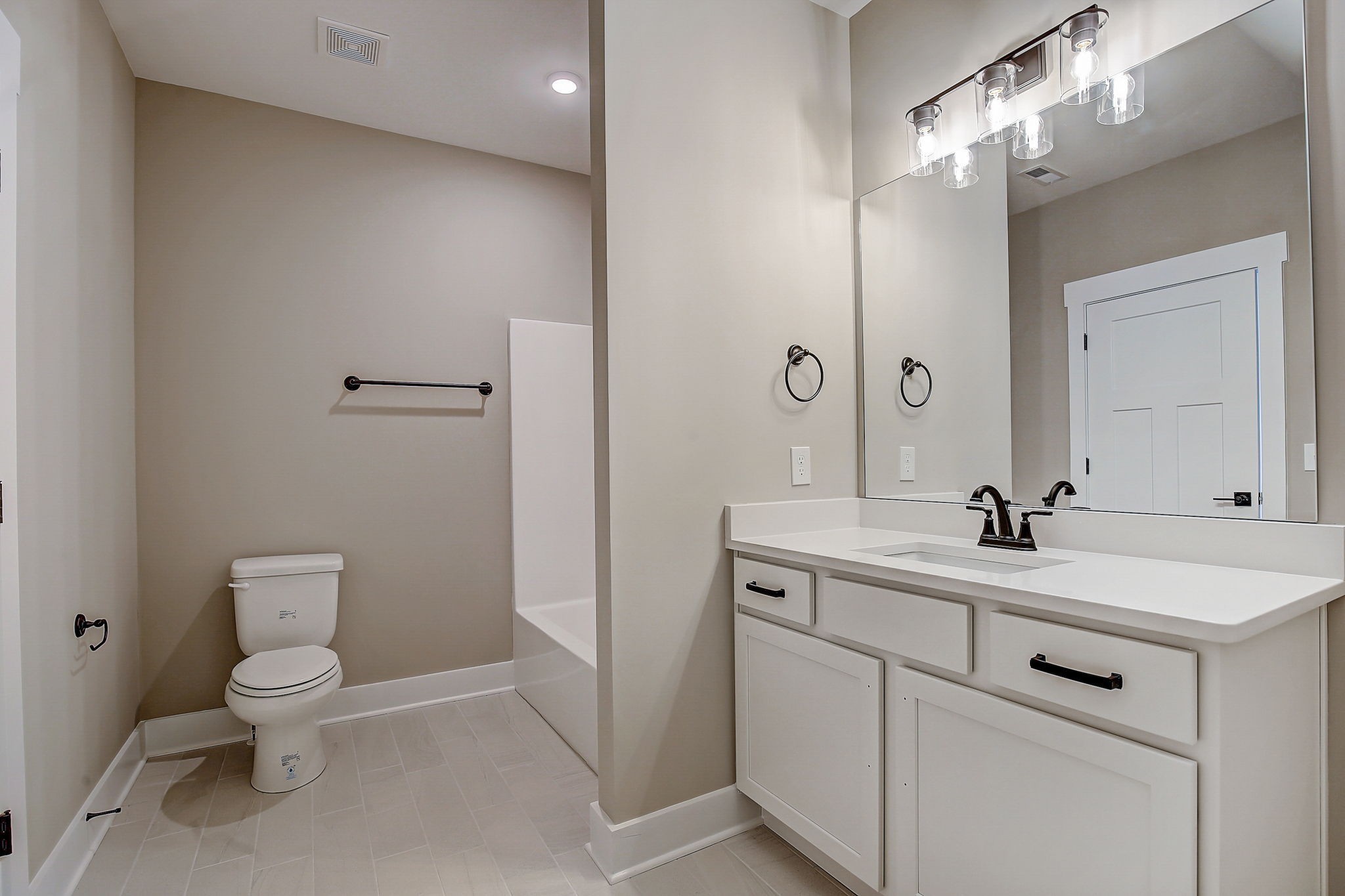 7311 North Milton Road Milton, TN 37118 - Photo 46 of 54 a bathroom with a sink a toilet a mirror and shower