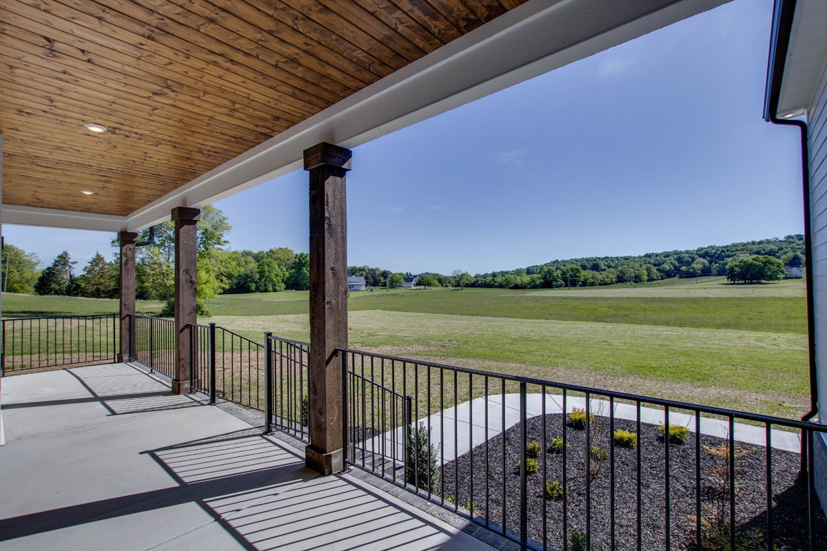 7311 North Milton Road Milton, TN 37118 - Photo 47 of 54 a view of a balcony with wooden floor & fence