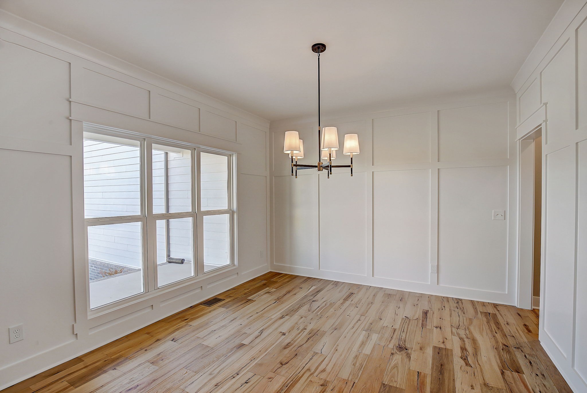 7311 North Milton Road Milton, TN 37118 - Photo 8 of 54 a view of empty room with wooden floor and fan