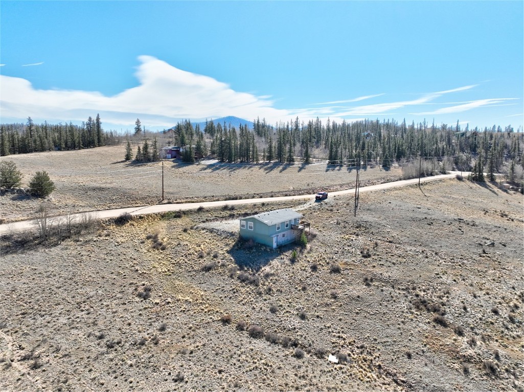 735 Apache Trail Como, CO 80456 - Photo 27 of 37 a view of a dry yard with trees