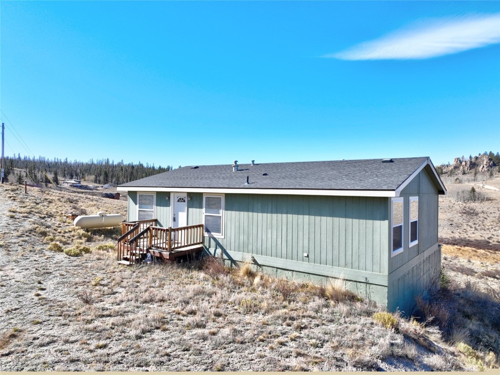 735 Apache Trail Como, CO 80456 - Photo 29 of 37 a roof deck with table and chairs