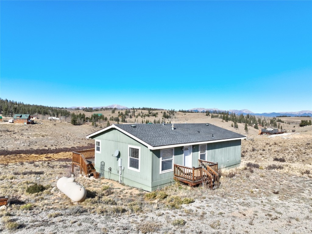 735 Apache Trail Como, CO 80456 - Photo 31 of 37 an aerial view of a house with a yard