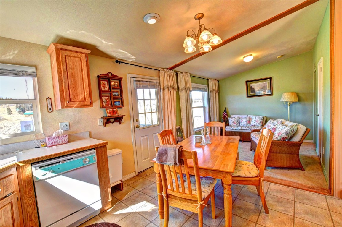735 Apache Trail Como, CO 80456 - Photo 6 of 37 a dining room with furniture and window