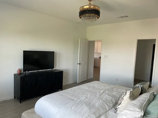 a view of outdoor space with a wooden deck and a garden