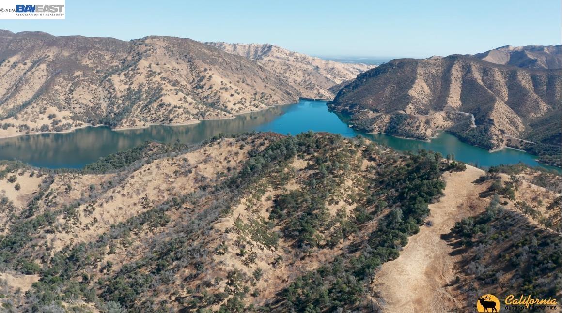 0 Greaves Road Napa, CA 94558 - Photo 3 of 8 a view of a lake with mountains in the background
