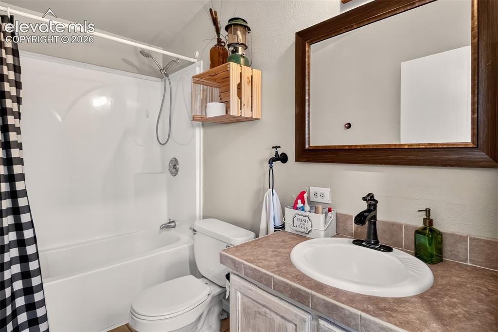 750 Yoder Street Calhan, CO 80808 - Photo 22 of 50 Main level bath.