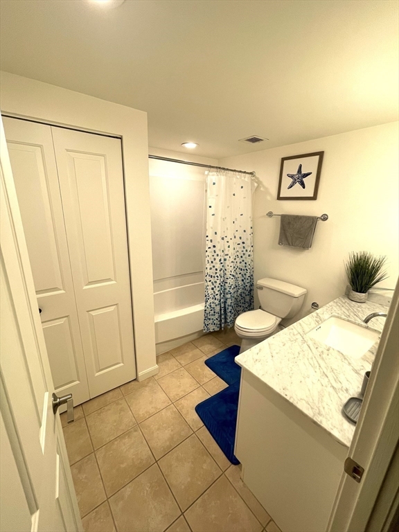 10 Museum Way, Unit 321 Cambridge, MA 02141 - Photo 13 of 15 a bathroom with a sink toilet and shower