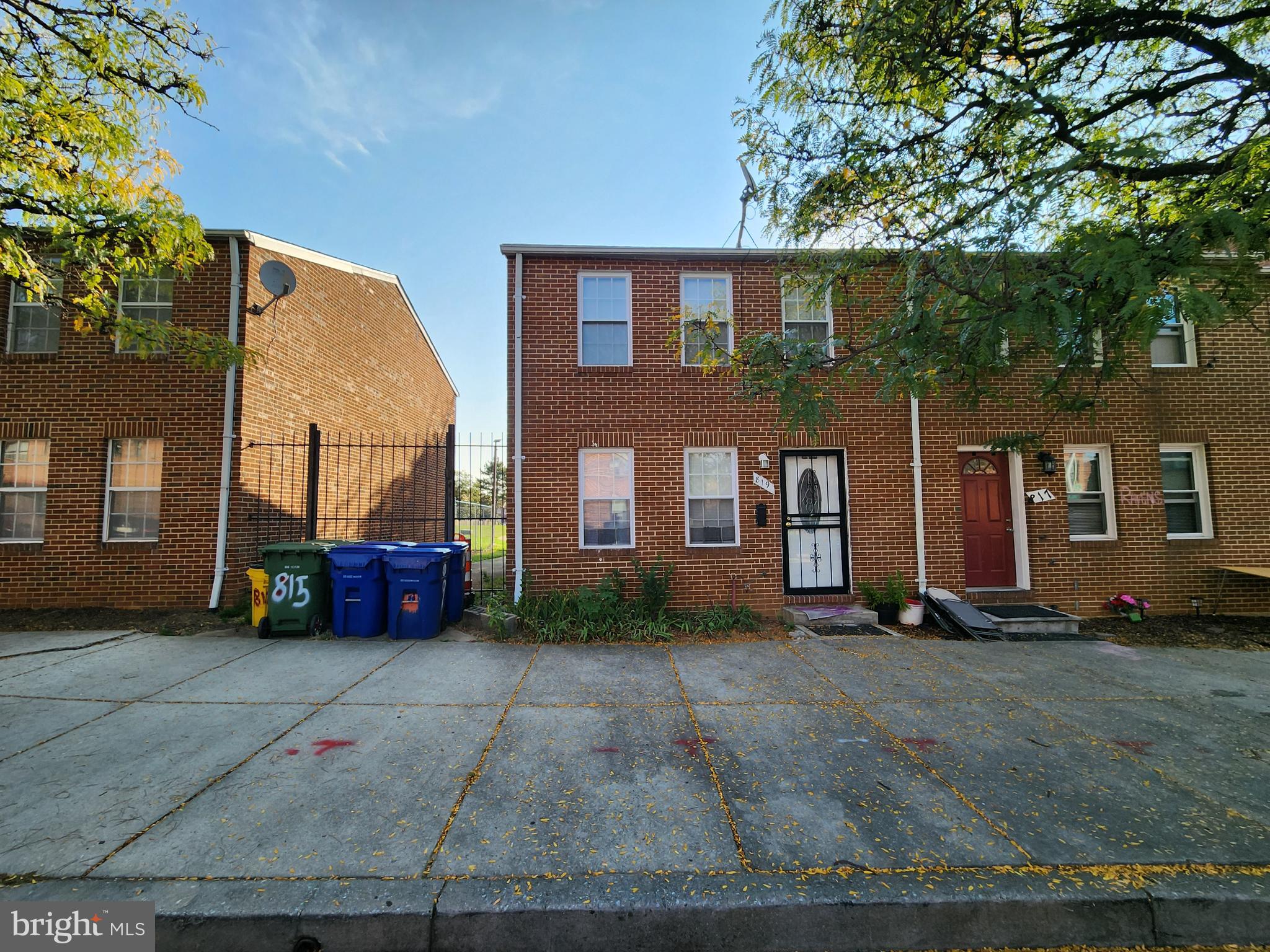 819 Aisquith Street Baltimore, MD 21202 - Photo 1 of 24 a view of a house with a yard