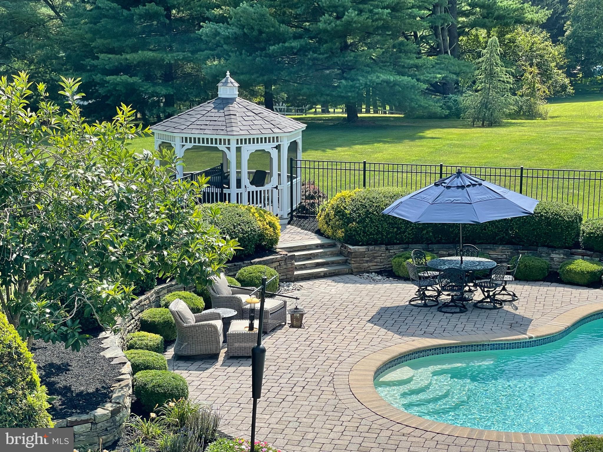 12215 Etchison Road Ellicott City, MD 21042 - Photo 11 of 46 Lounging areas and the gazebo add up to more fun!