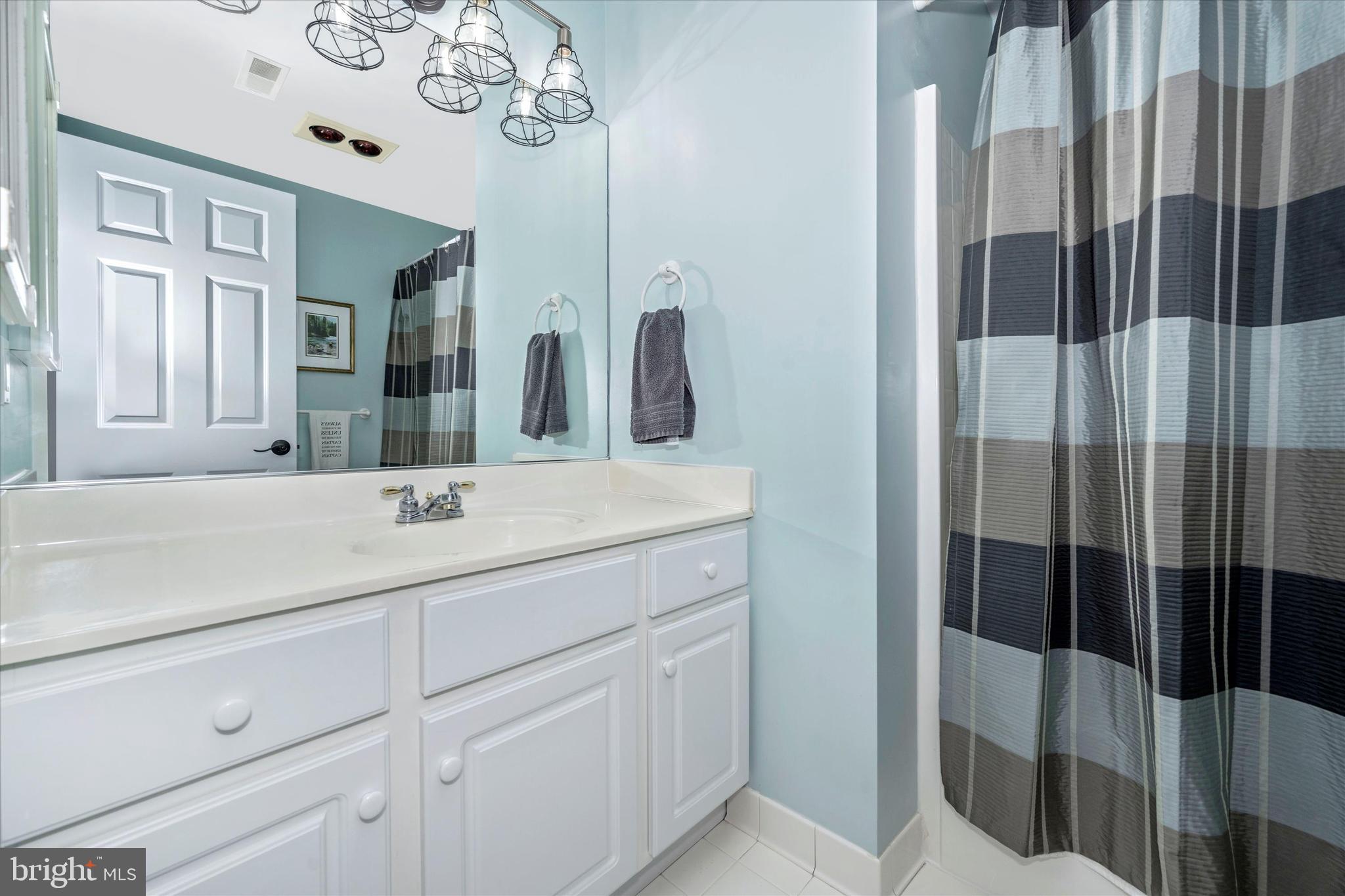 12215 Etchison Road Ellicott City, MD 21042 - Photo 26 of 46 Ensuite bath in second bedroom