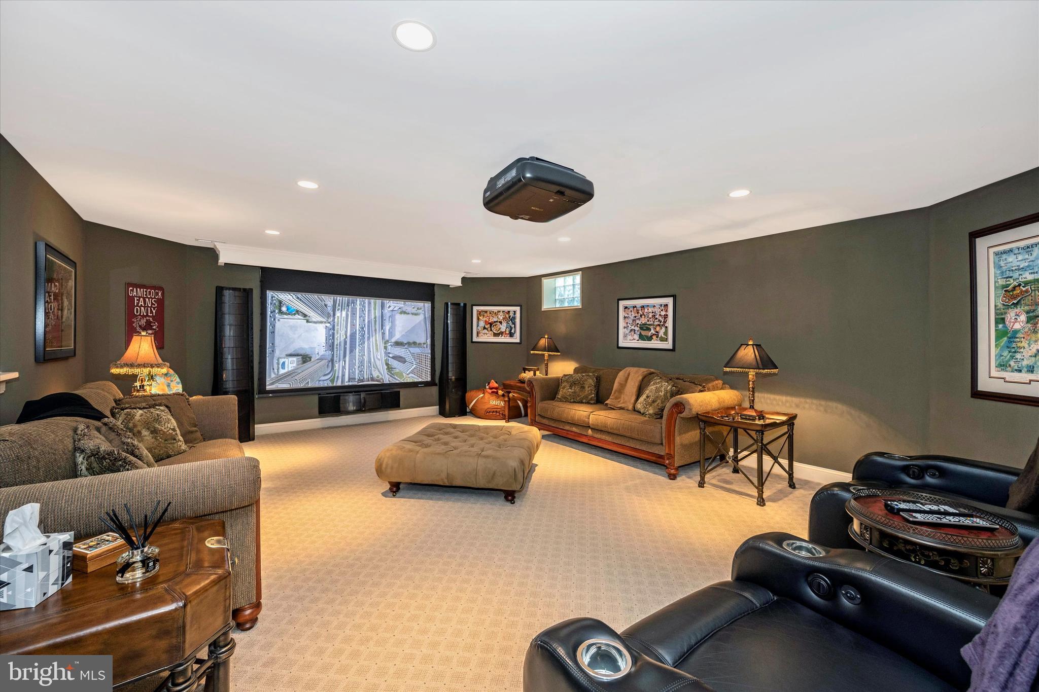 12215 Etchison Road Ellicott City, MD 21042 - Photo 32 of 46 LL family room, remotely controlled theatre screen