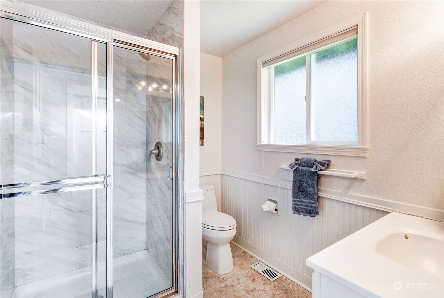 25 Cascade Key Bellevue, WA 98006 - Photo 19 of 33 a bathroom with a sink toilet and shower