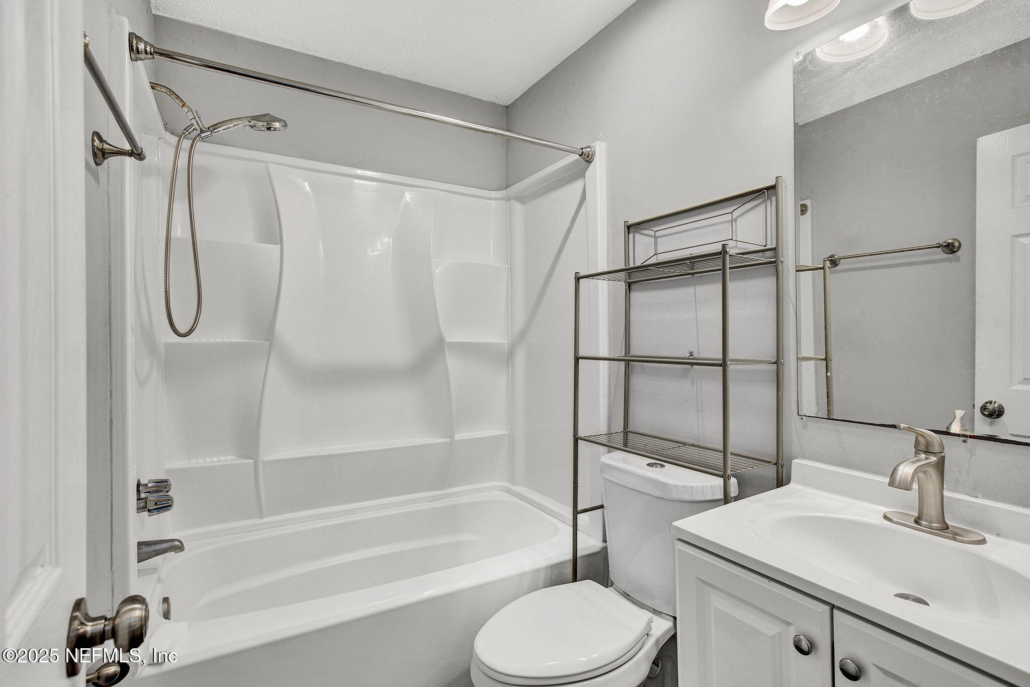 591 Julia Street St. Augustine, FL 32084 - Photo 12 of 19 a bathroom with a sink toilet and shower