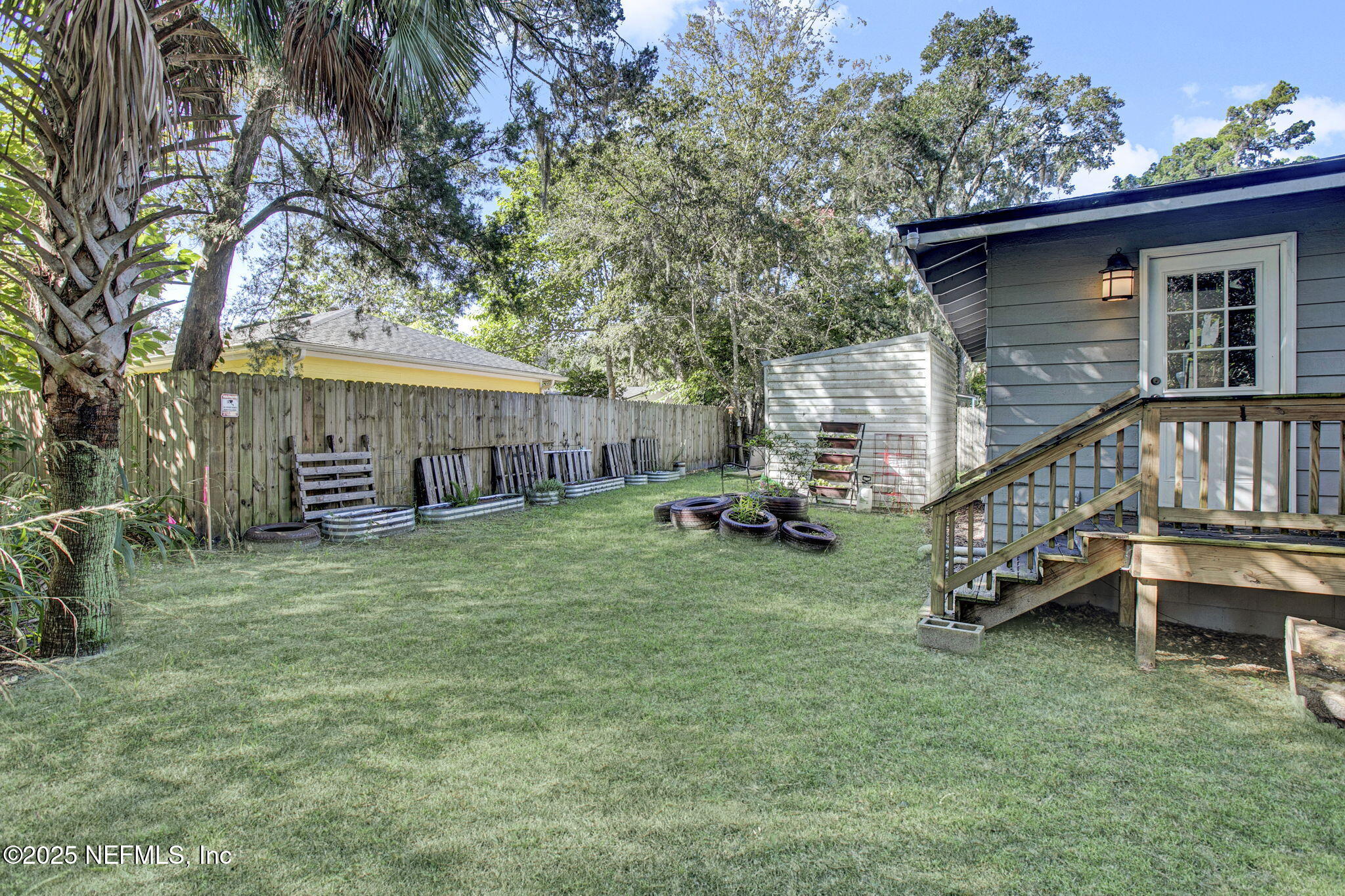591 Julia Street St. Augustine, FL 32084 - Photo 18 of 19 a view of a house with a yard