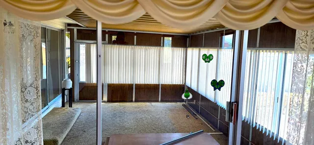 a view of a swimming pool with an ocean view