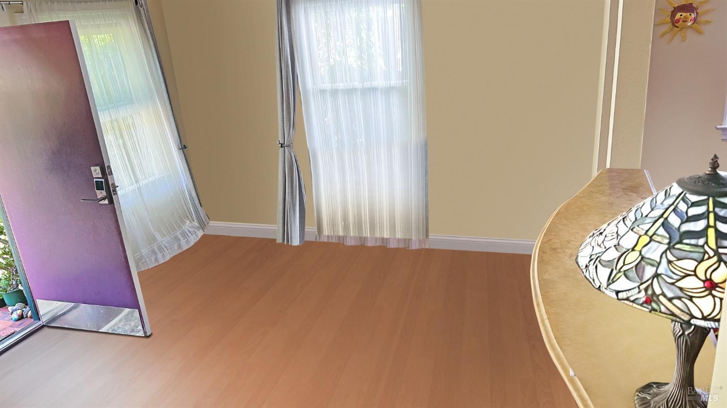 2020-2022 Fifth Avenue San Rafael, CA 94901 - Photo 20 of 22 2022 Entry Way and Living room