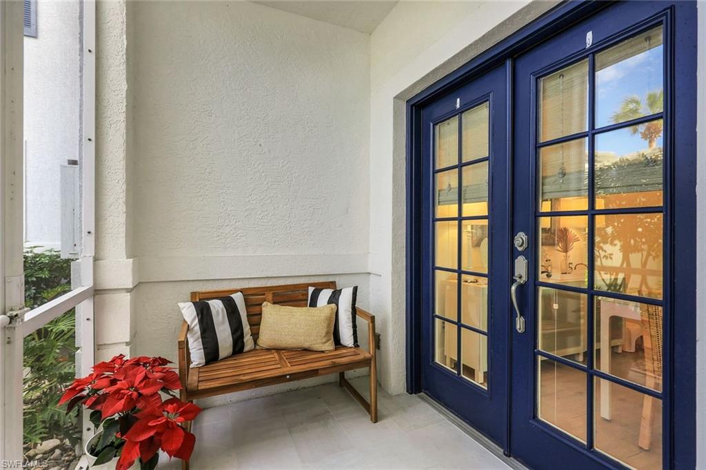 7108 Barrington Circle Naples, FL 34108 - Photo 3 of 25 a bedroom with furniture and a window