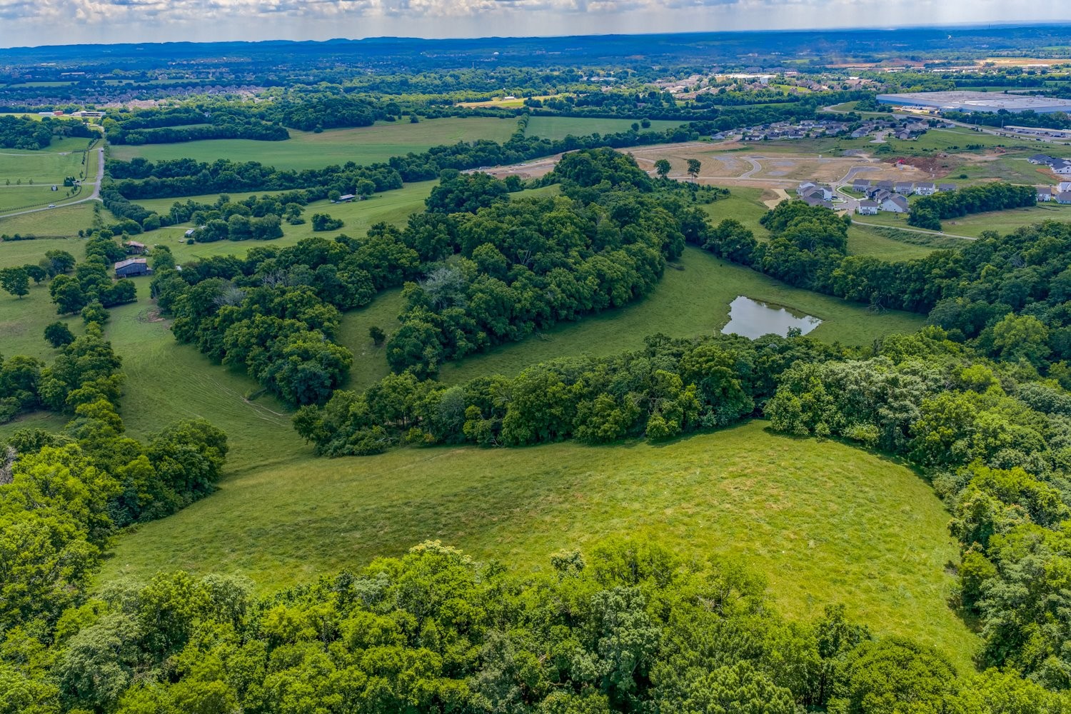 2200 Sugar Ridge Road Spring Hill, TN 37174 - Photo 28 of 41 an aerial view of ocean with green space and mountain view