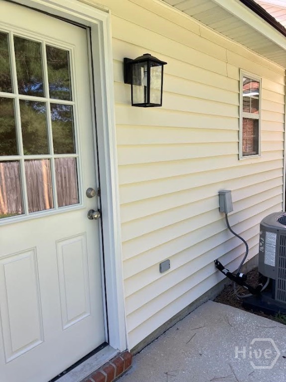 685 Rushing Street Richmond Hill, GA 31324 - Photo 26 of 34 Back door and new light fixtre