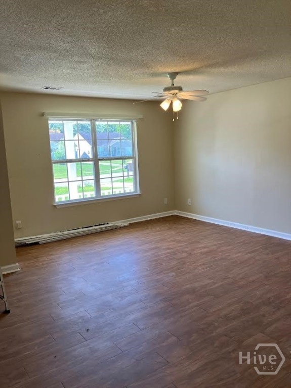 685 Rushing Street Richmond Hill, GA 31324 - Photo 5 of 34 Living room with ceiling fan