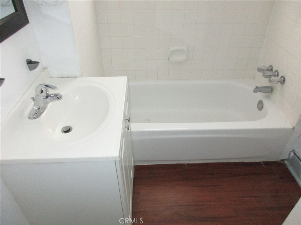 3076 Lemon Street Riverside, CA 92501 - Photo 11 of 28 a bathroom with a bathtub
