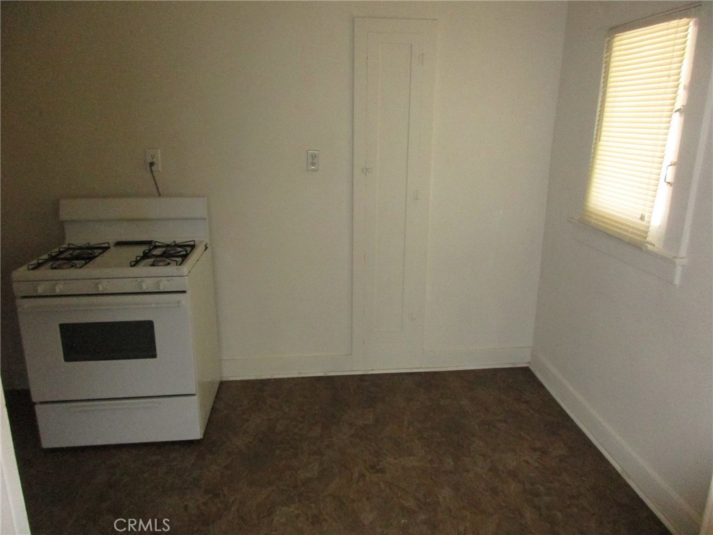 3076 Lemon Street Riverside, CA 92501 - Photo 14 of 28 a view of a kitchen with a stove top oven