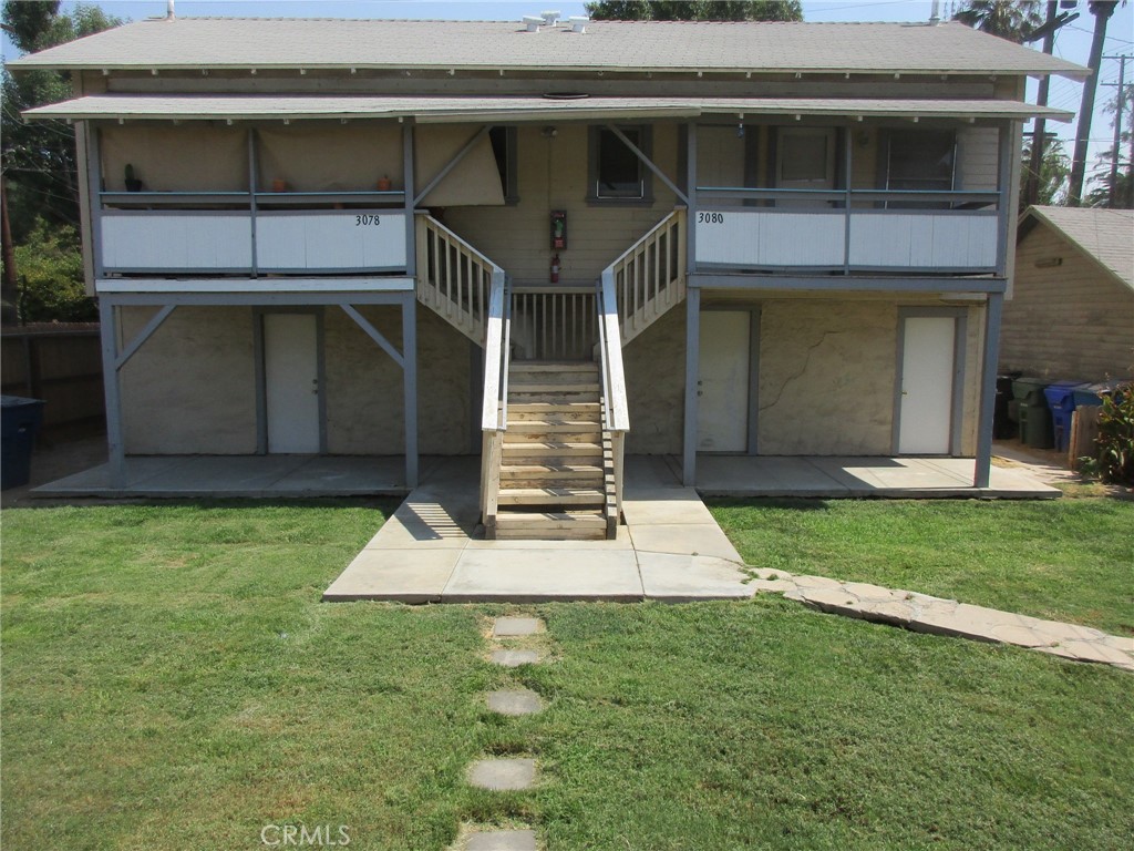 3076 Lemon Street Riverside, CA 92501 - Photo 2 of 28 a front view of a house with a yard