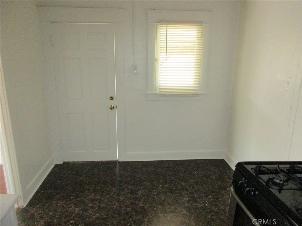3076 Lemon Street Riverside, CA 92501 - Photo 27 of 28 an empty room with a stove