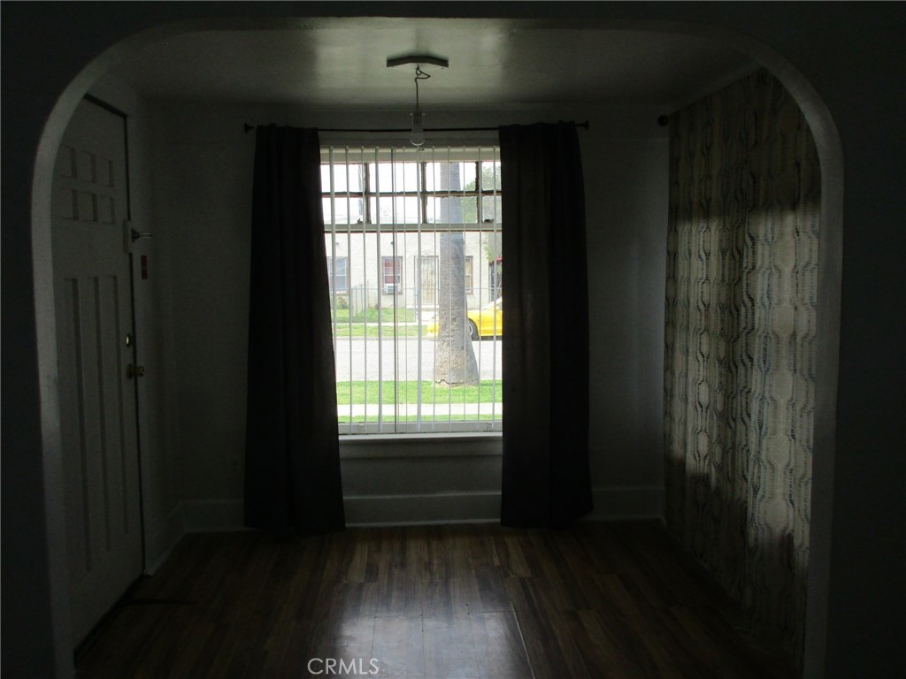 3076 Lemon Street Riverside, CA 92501 - Photo 10 of 28 a view of an empty room and wooden floor