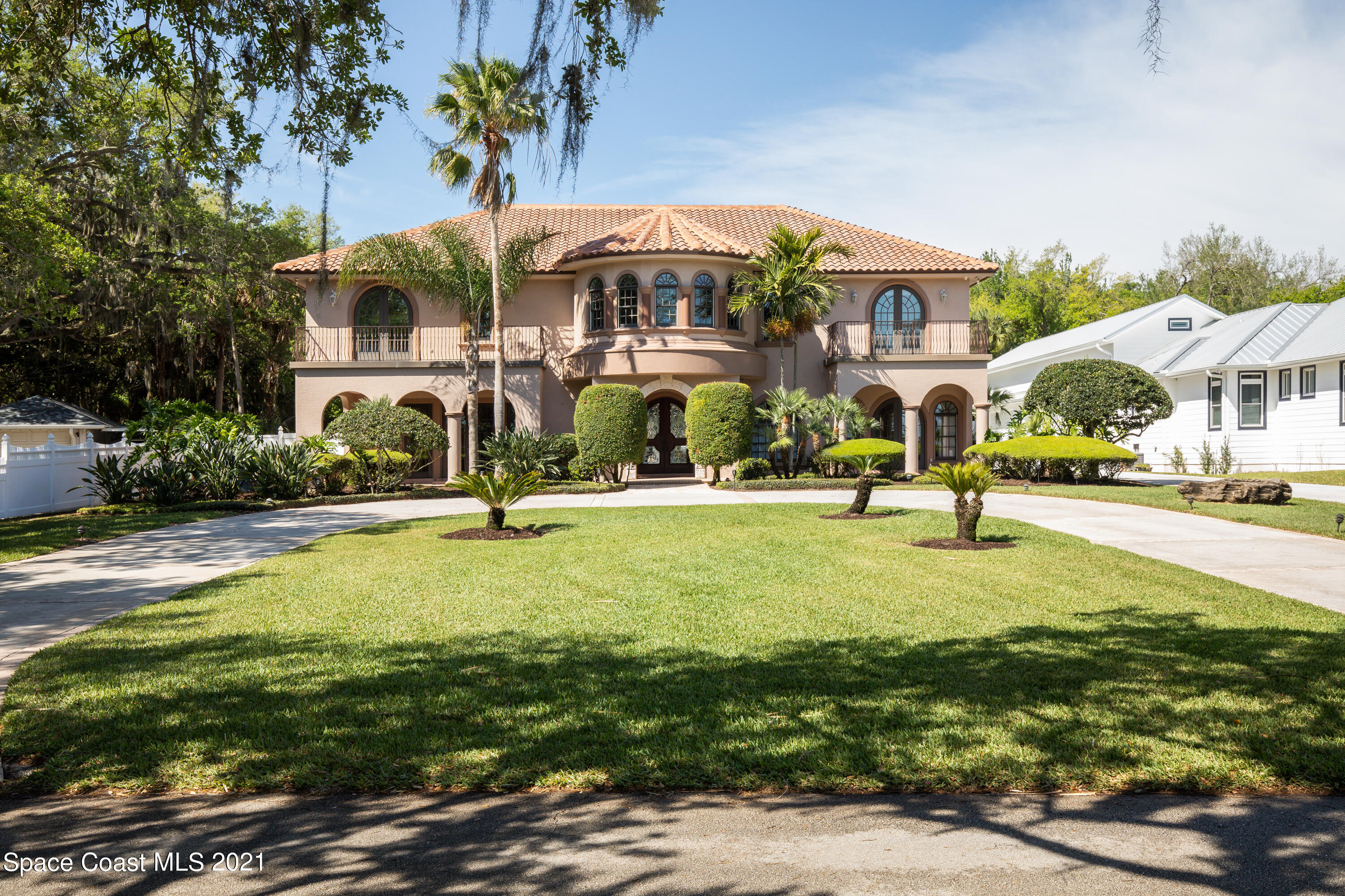 a front view of building with yard