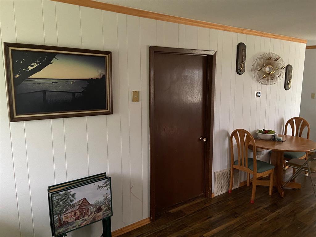 104 County Road 1296 Morgan, TX 76671 - Photo 16 of 27 a living room with furniture and a painting on the wall