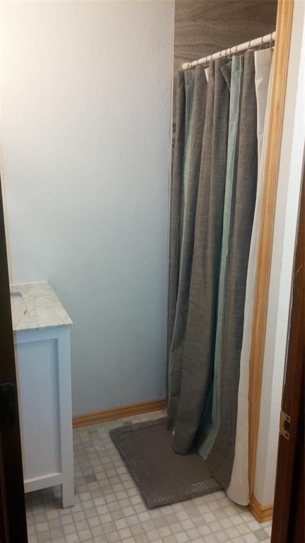 104 County Road 1296 Morgan, TX 76671 - Photo 7 of 27 a view of a bathroom with sink