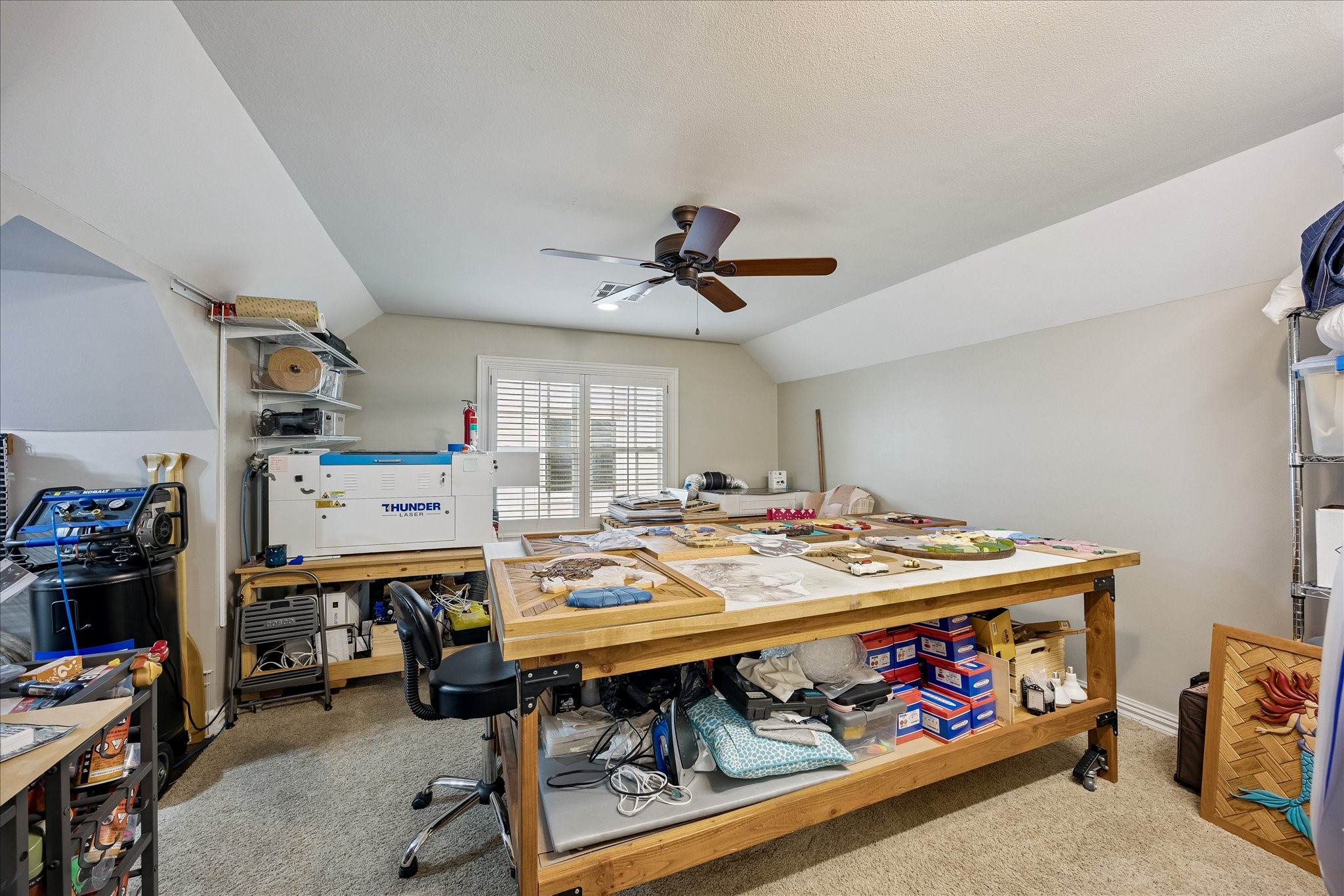 6358 Auden Street Houston, TX 77005 - Photo 34 of 50 a bed room with a bed and a table