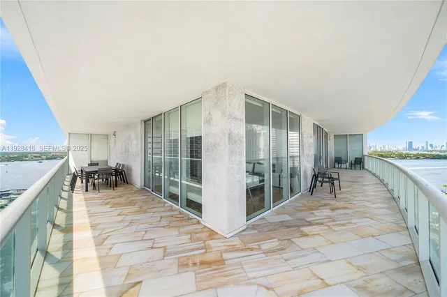 a view of ocean with balcony