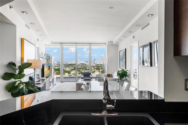 a view of a living room and dining room