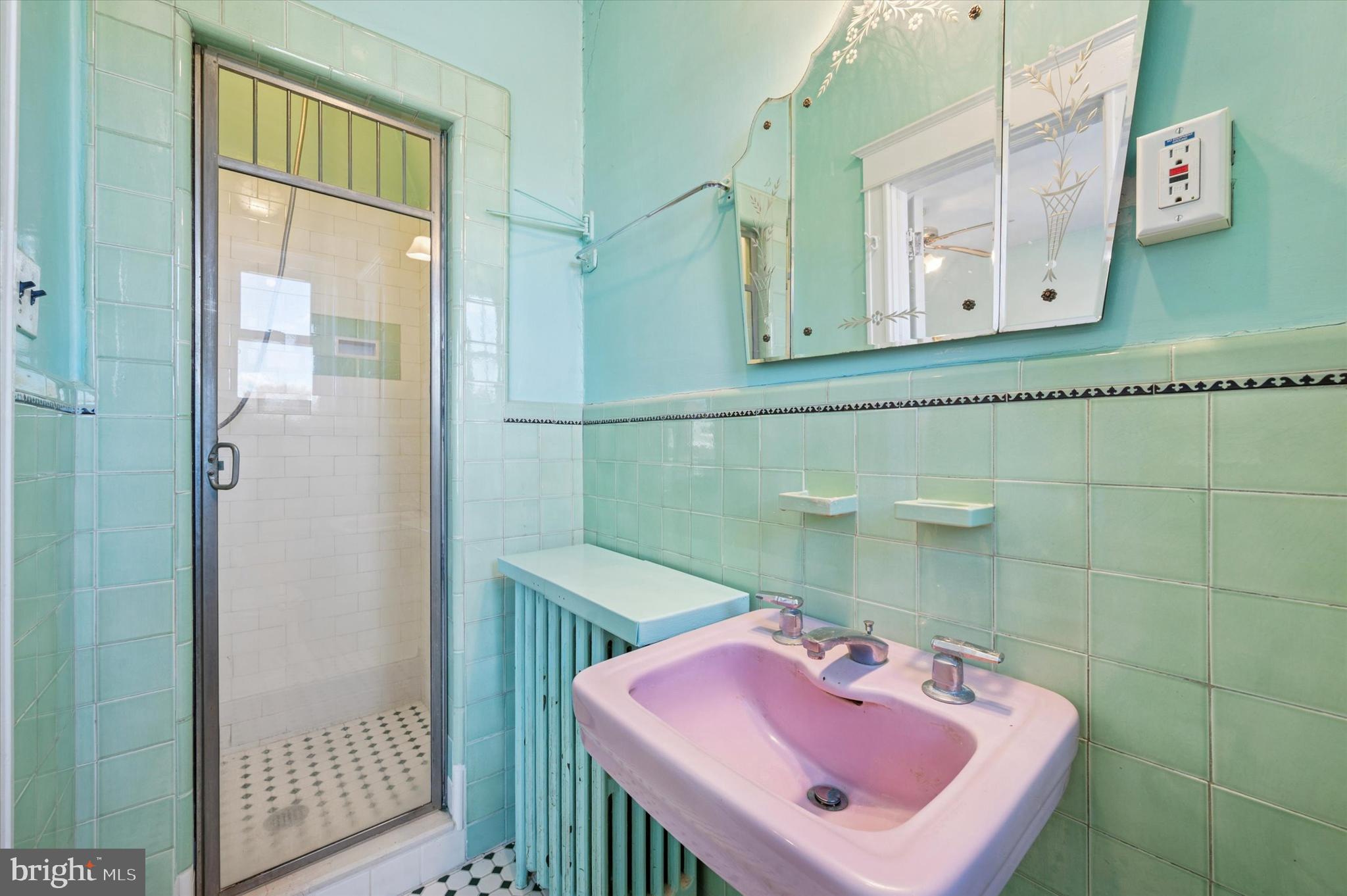 262 Bayard Road Upper Darby, PA 19082 - Photo 20 of 25 a bathroom with a sink and a mirror