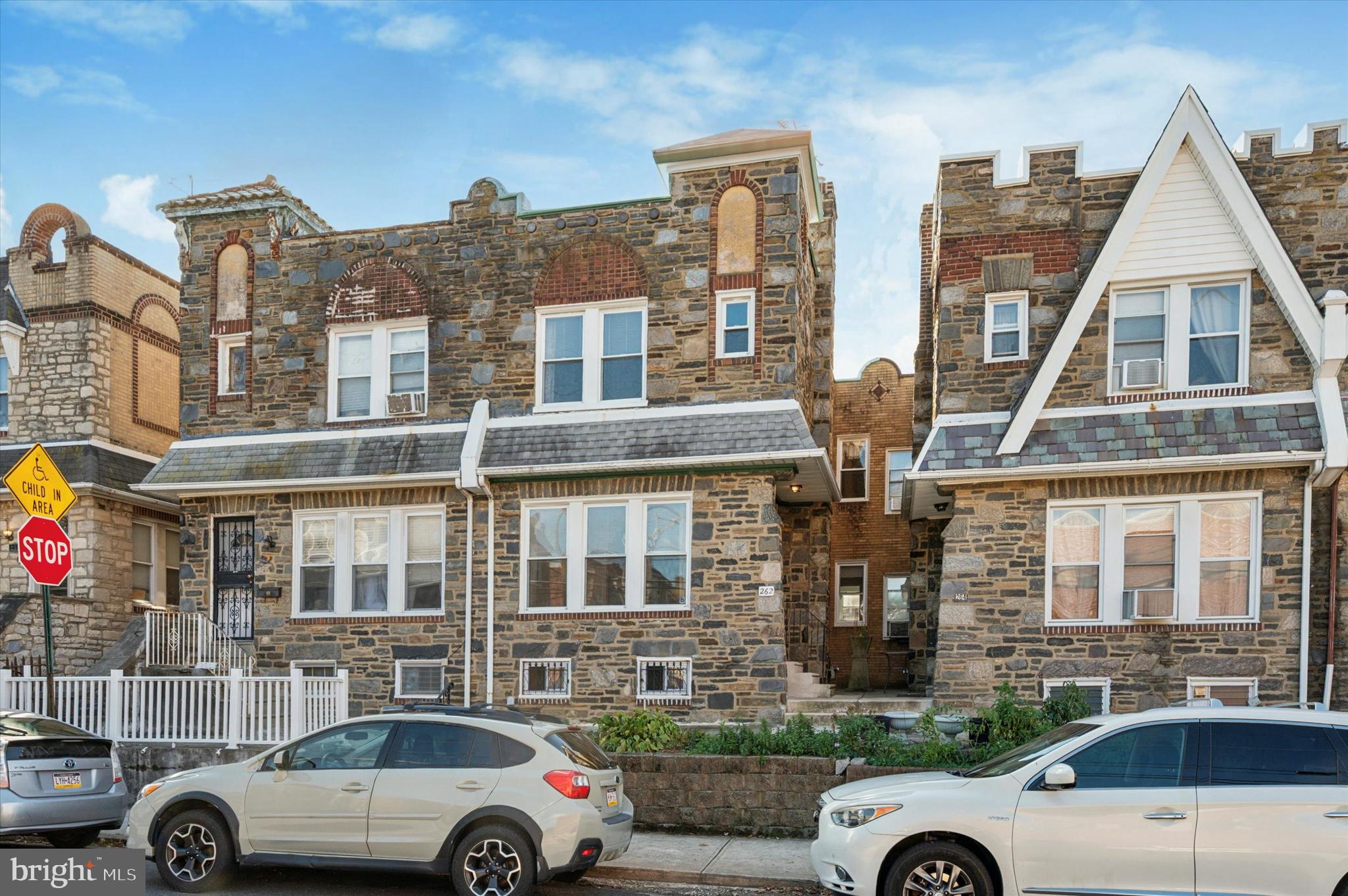262 Bayard Road Upper Darby, PA 19082 - Photo 2 of 25 a front view of a building with parking space