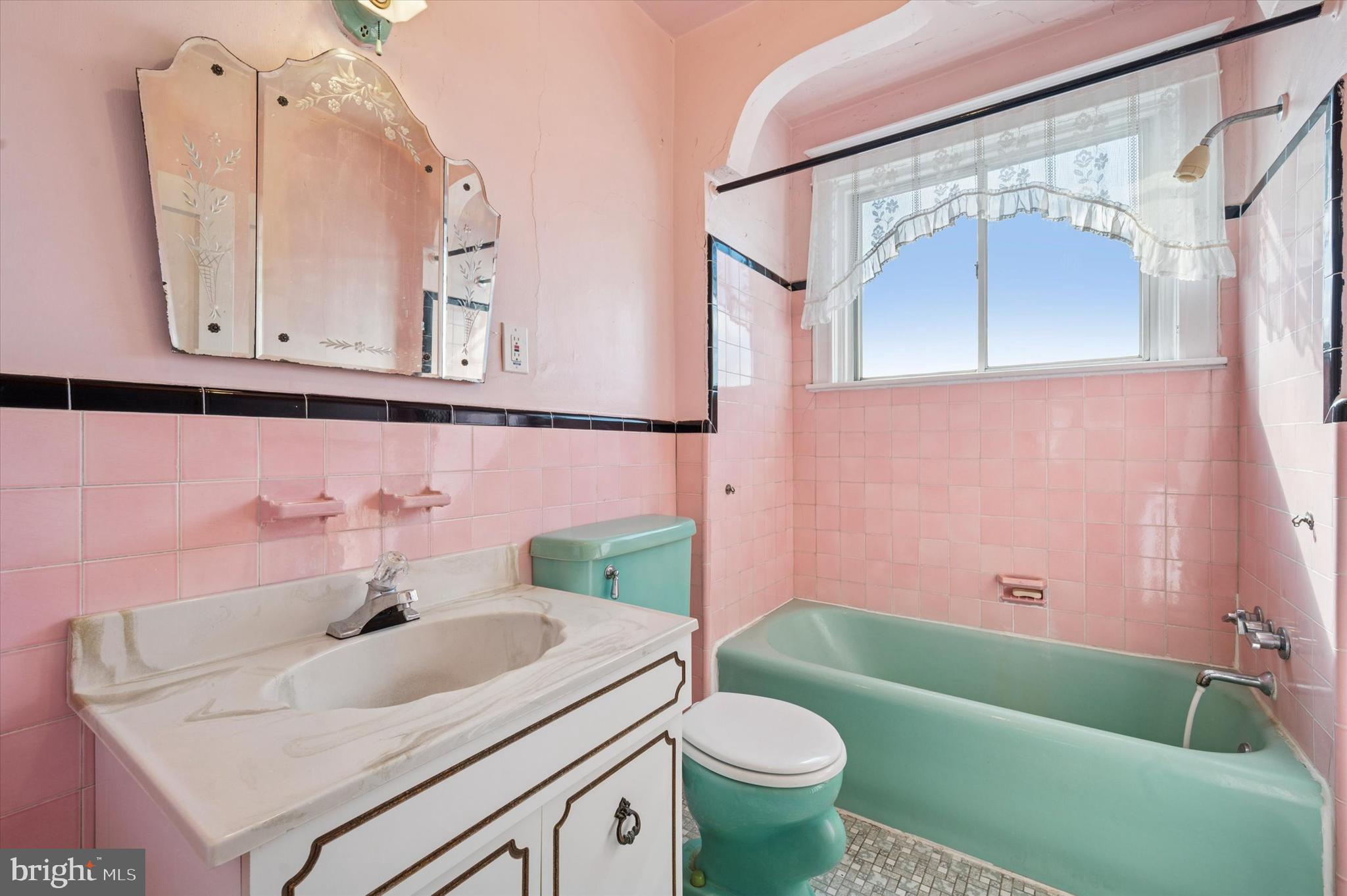 262 Bayard Road Upper Darby, PA 19082 - Photo 23 of 25 a bathroom with a sink and a mirror