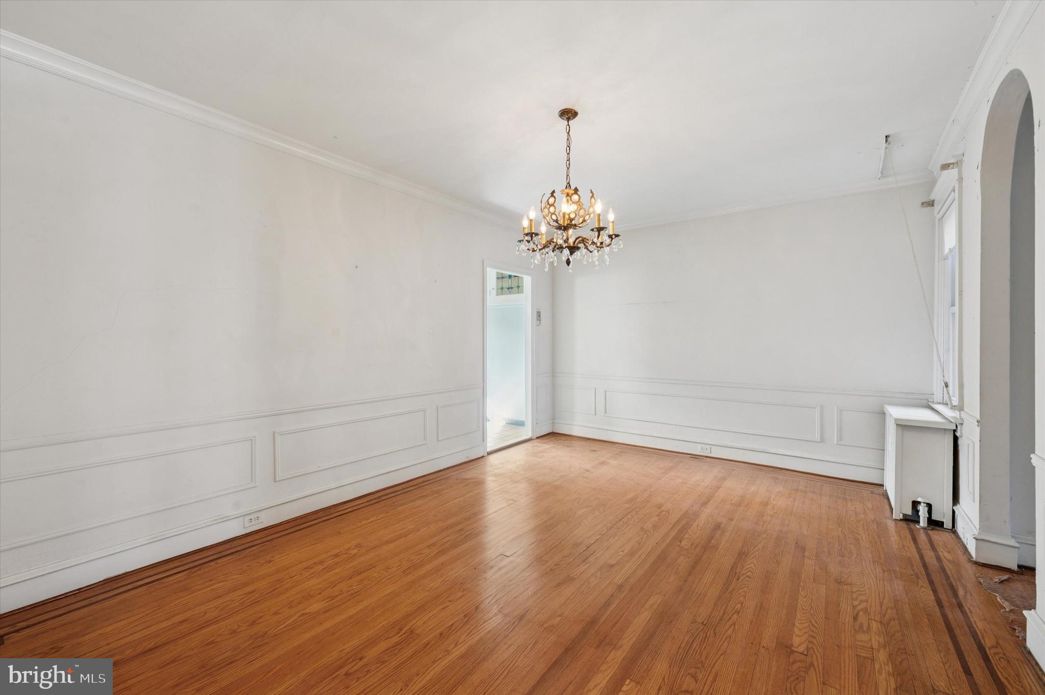 262 Bayard Road Upper Darby, PA 19082 - Photo 7 of 25 a view of an empty room and wooden floor