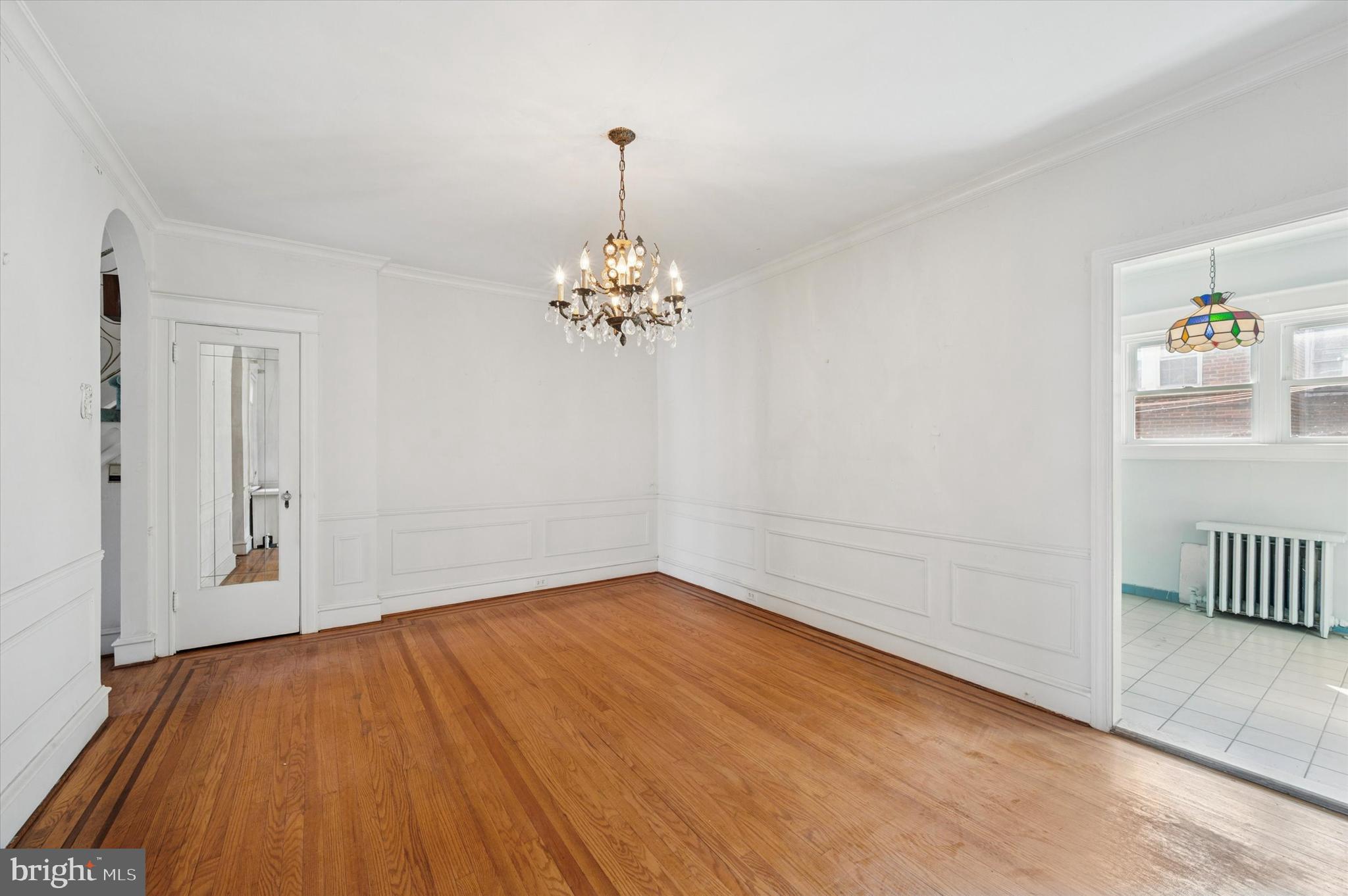 262 Bayard Road Upper Darby, PA 19082 - Photo 8 of 25 a view of empty room with wooden floor
