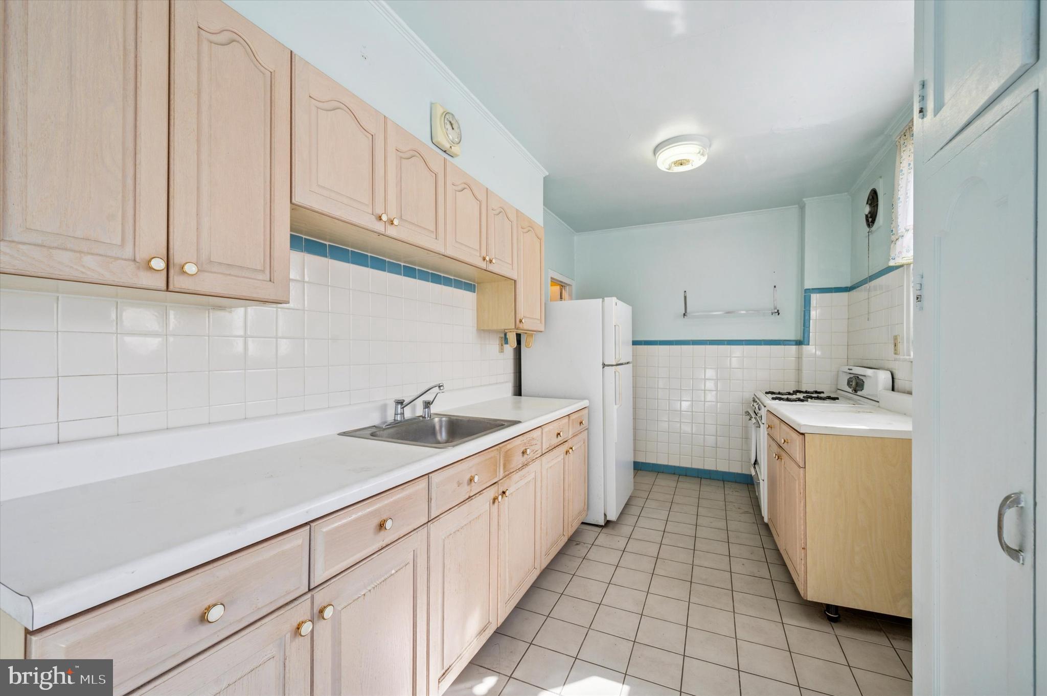 262 Bayard Road Upper Darby, PA 19082 - Photo 10 of 25 a kitchen with sink cabinets and utility