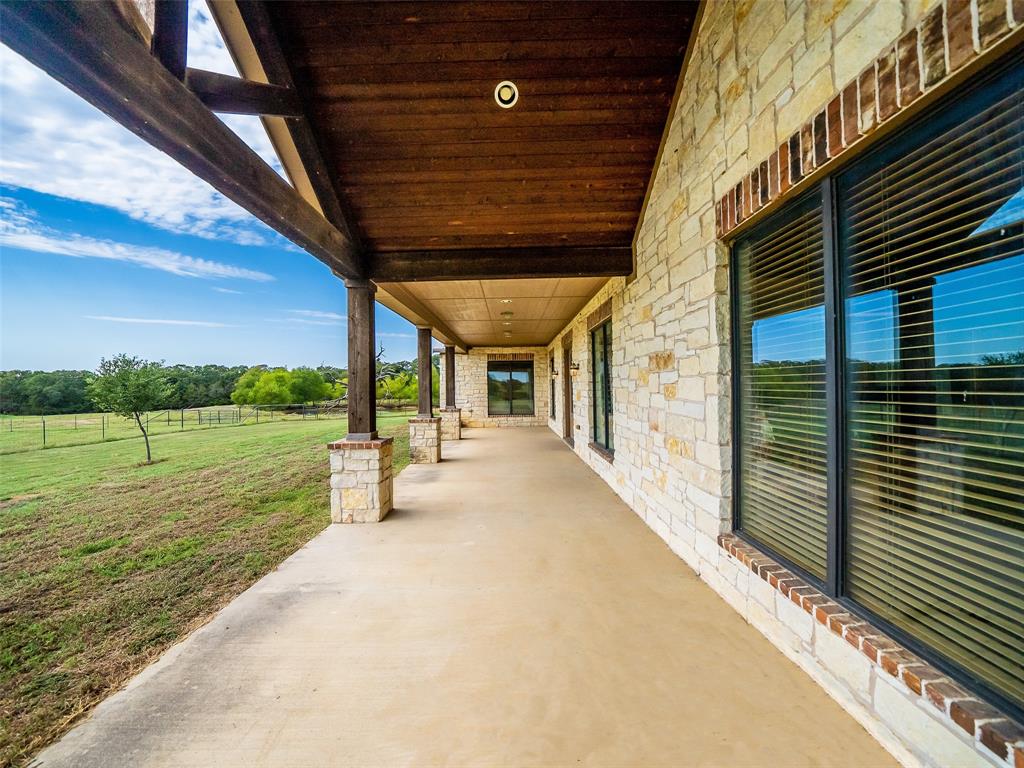 453 Tower Road Valley View, TX 76272 - Photo 12 of 38 a view of a porch with a backyard