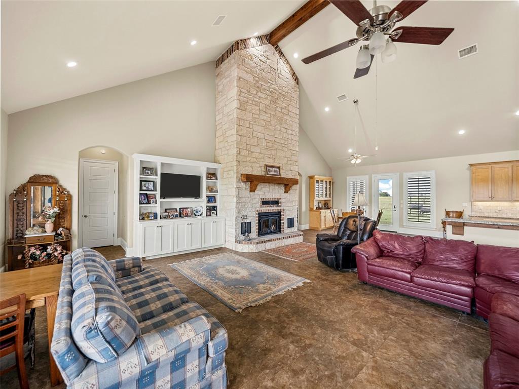 453 Tower Road Valley View, TX 76272 - Photo 15 of 38 a living room with furniture fireplace and flat screen tv