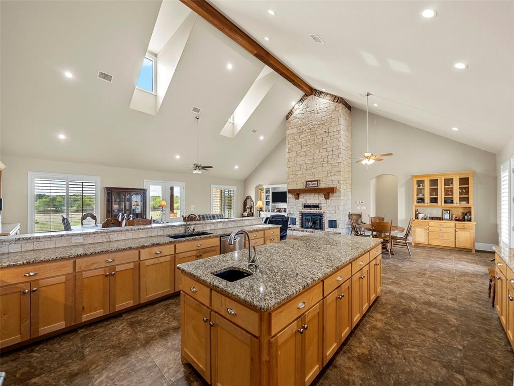 453 Tower Road Valley View, TX 76272 - Photo 16 of 38 a kitchen with a stove sink and cabinets