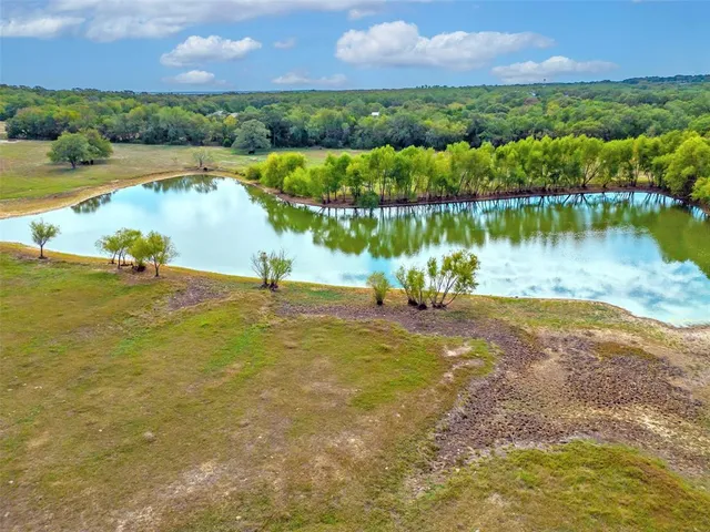 a view of a lake with a city