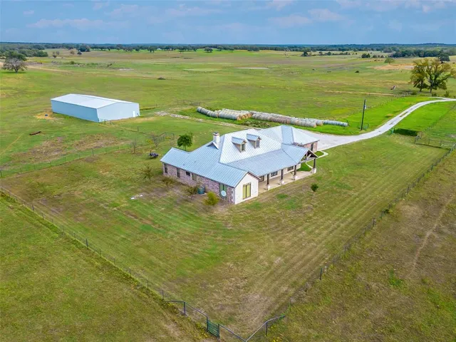 a view of an ocean and a mountain