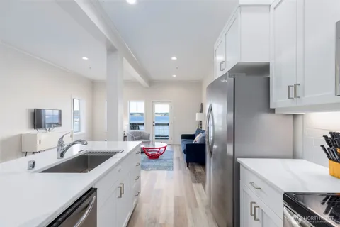 a bedroom with a bed and a table