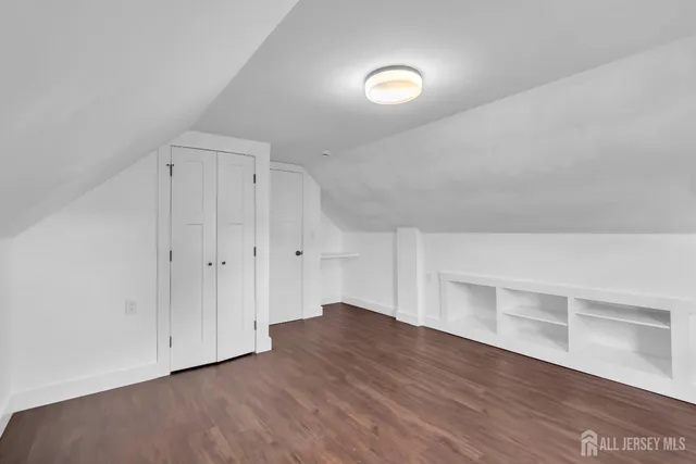 a view of a room with wooden floor and iron walls