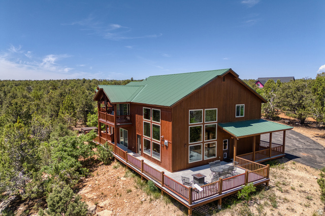 755 South Zion Ridge Drive Orderville, UT 84758 - Photo 3 of 84 Rear view of property with a metal roof and a deck