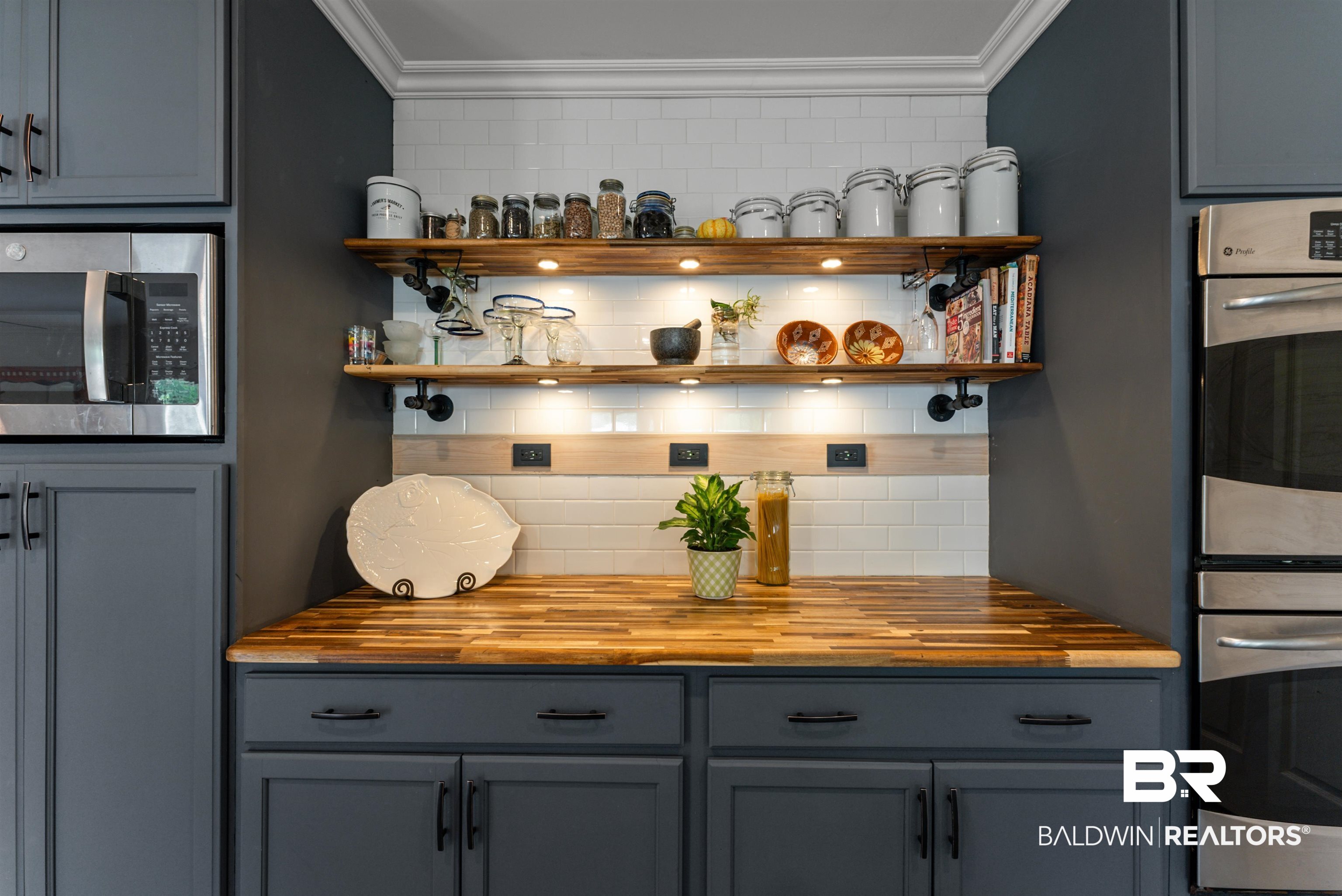 6447 Bemis Lane Bon Secour, AL 36511 - Photo 10 of 62 Butcher block-style countertops with dark cabinetry